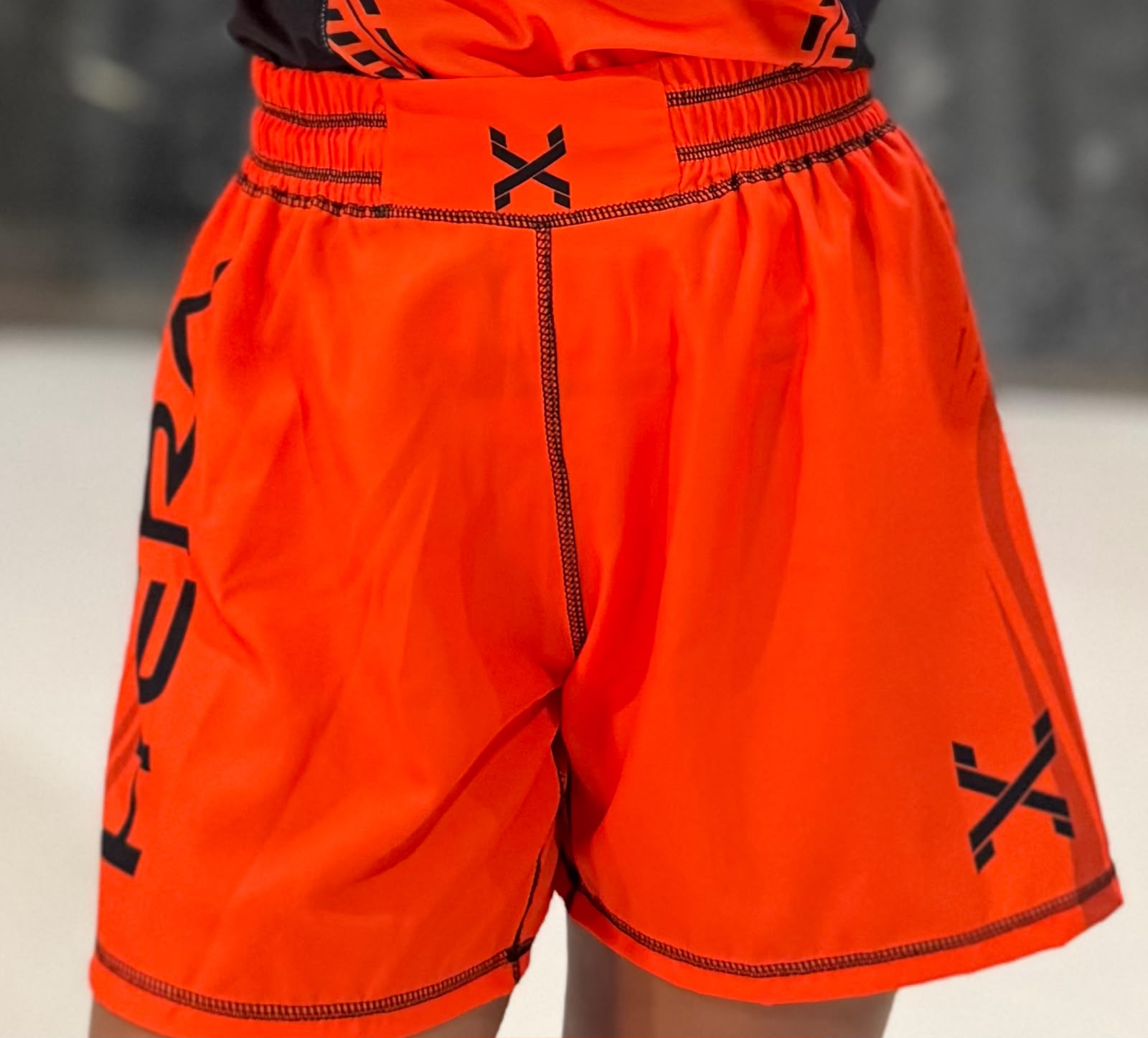 Short Laranja Adulto